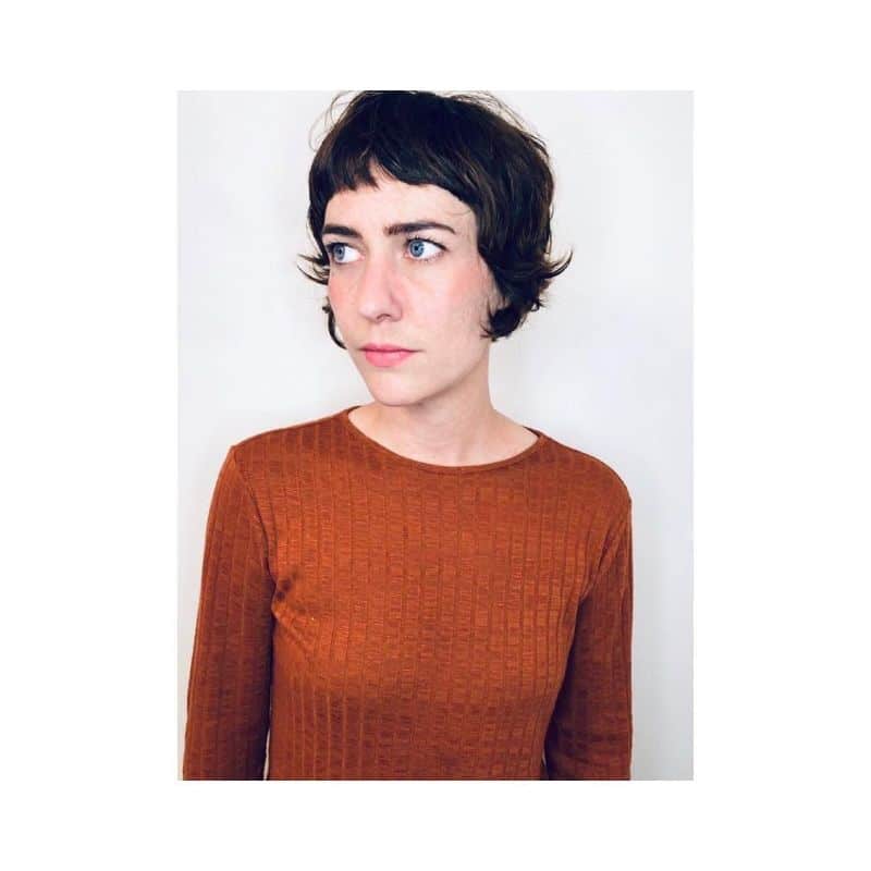 3. Soft Textured Pixie with Micro Bangs