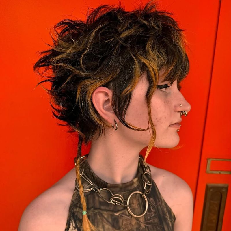 37. Textured Pixie with Bold Highlights