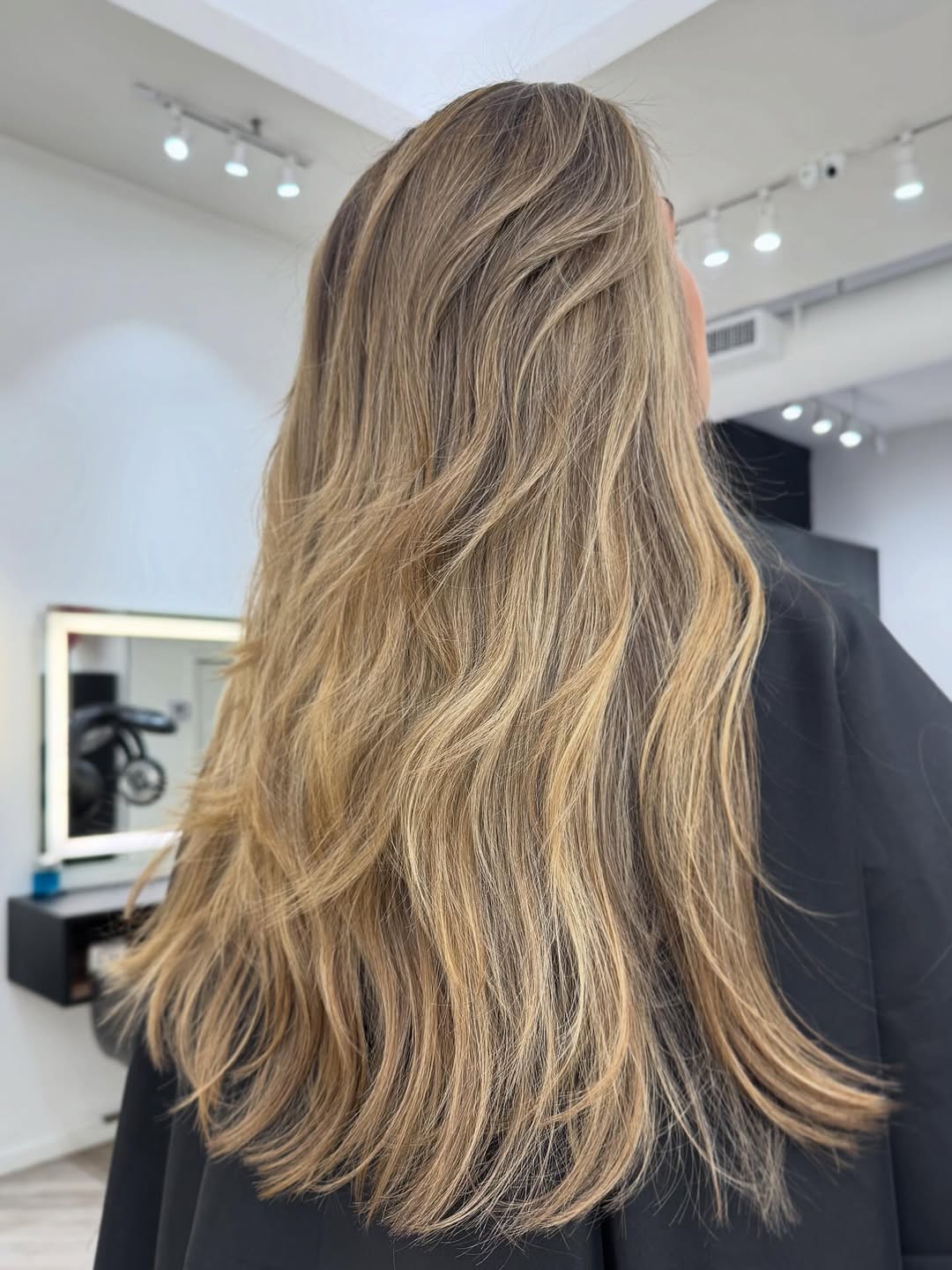 21. Ash Blonde Feathered Layers