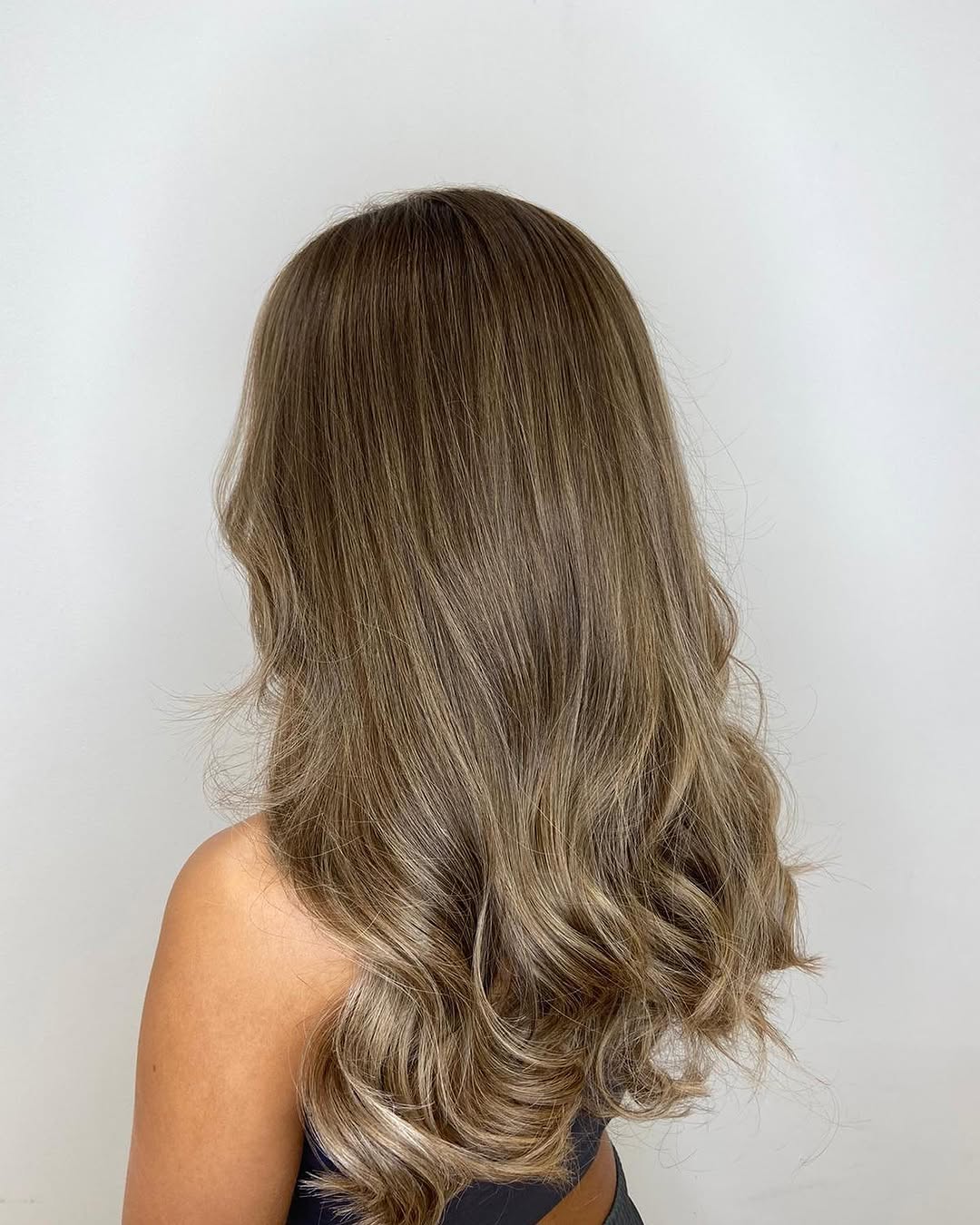 50. Ash Blonde Melt with Soft Waves