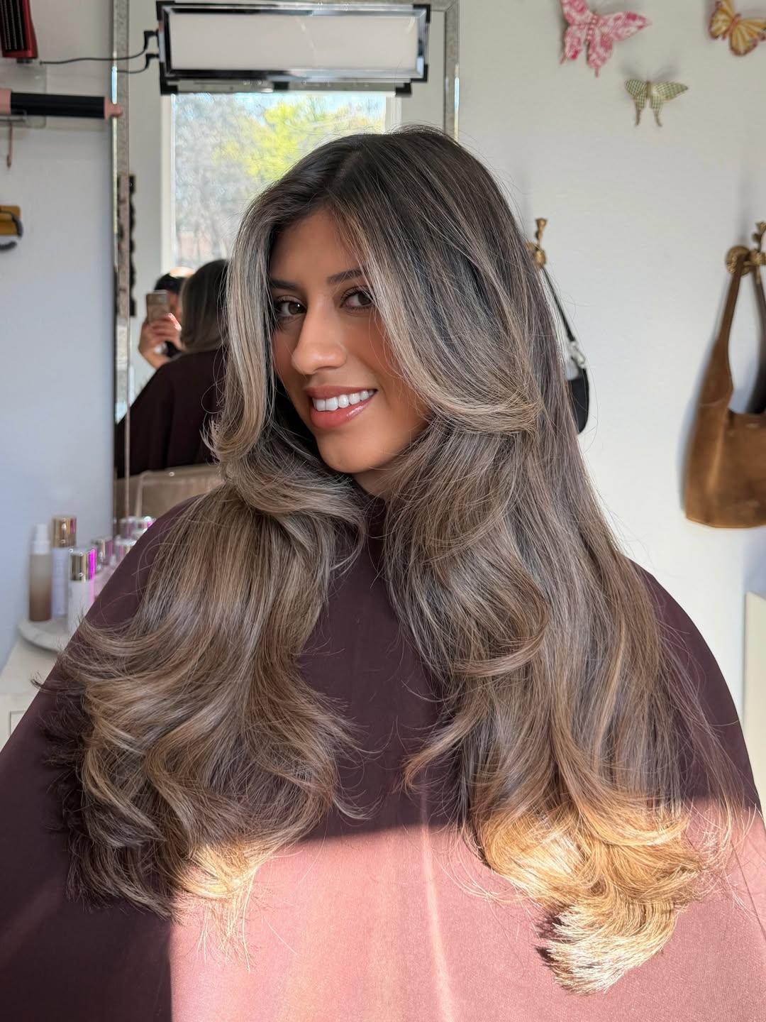 34. Ash Bronde Blowout with Heavy Face-Framing Layers
