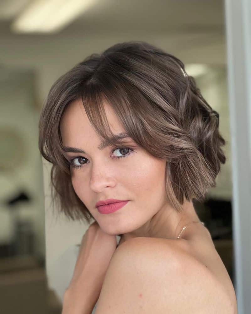 6. Ash Brown Bob with Curtain Bangs