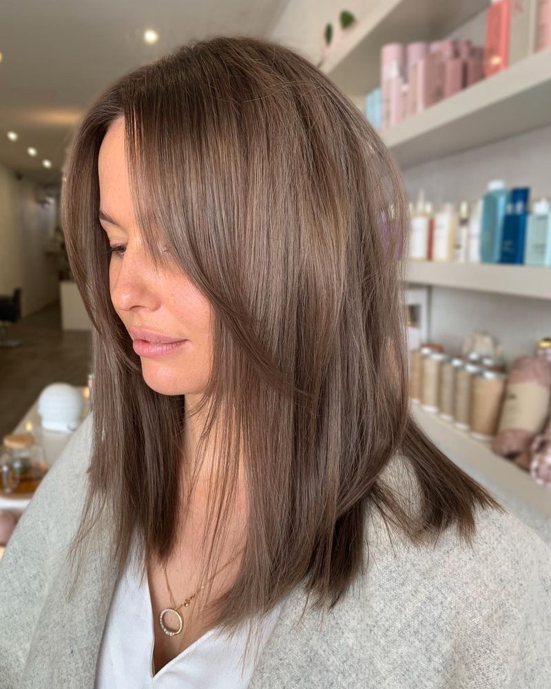 25. Ash Brown Shoulder-Length Cut with Soft Curtain Bangs