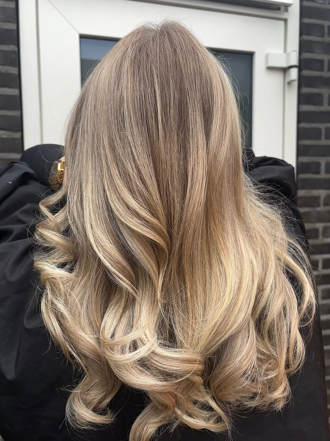 35. Ash and Honey Balayage Curls