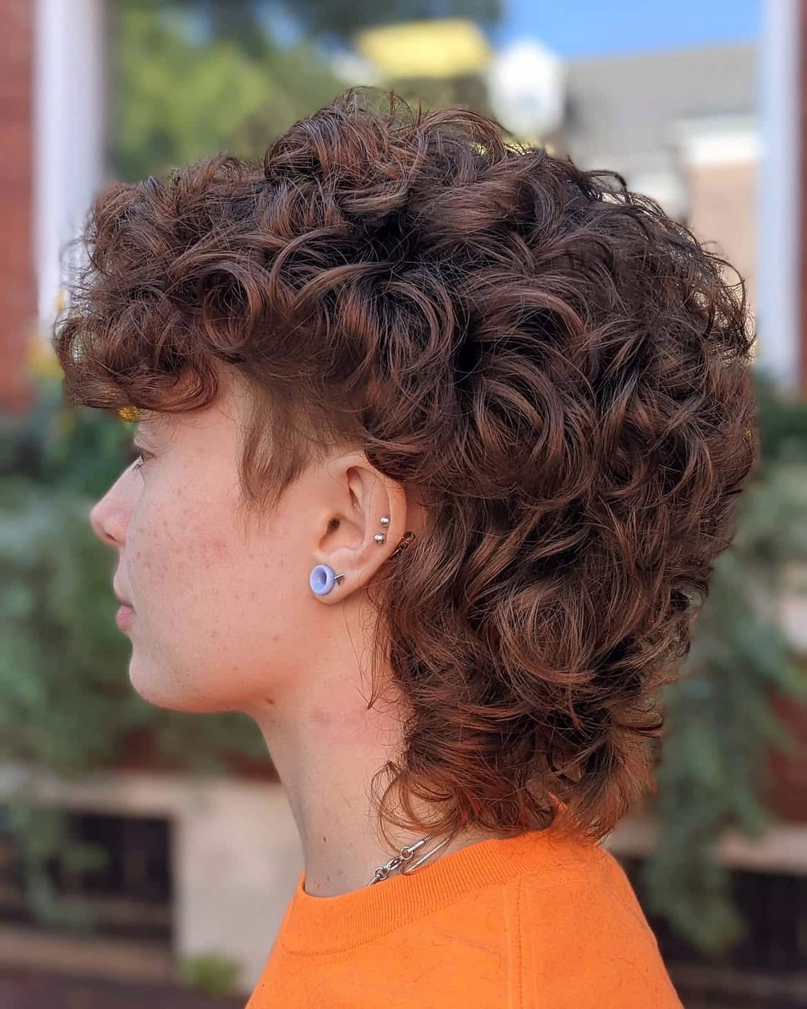 18. Auburn Curls with Shaved Sides