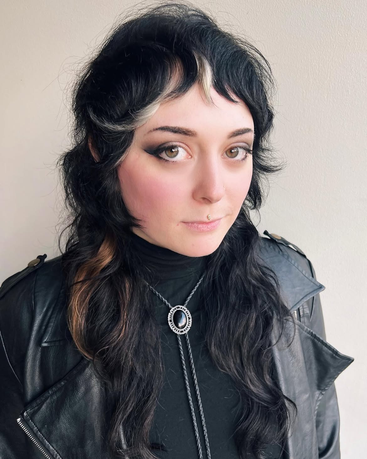 18. Black Wolfy Mullet with Blonde Peekaboo Bangs