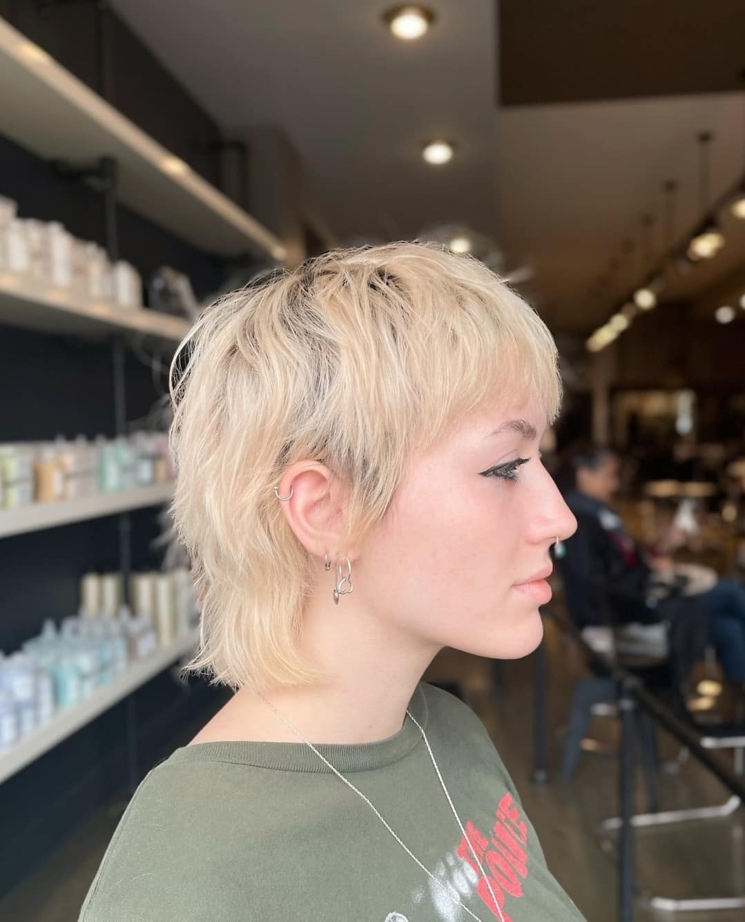 32. Bleach Blonde Shag with Tapered Neckline