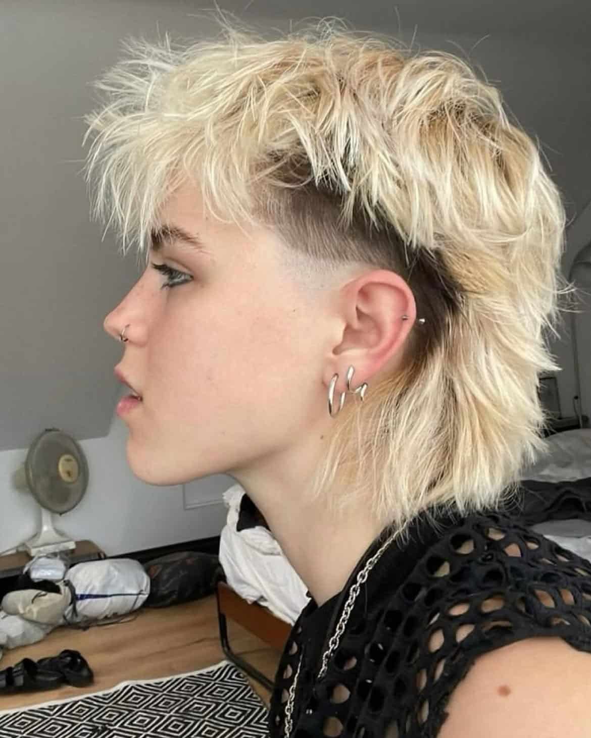 4. Bleached Shag Mullet with Shaved Sides