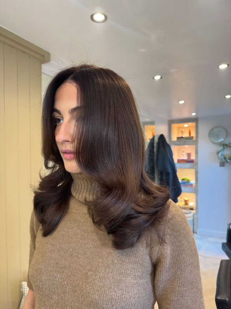 43. Blowout Layers with Curtain Bangs