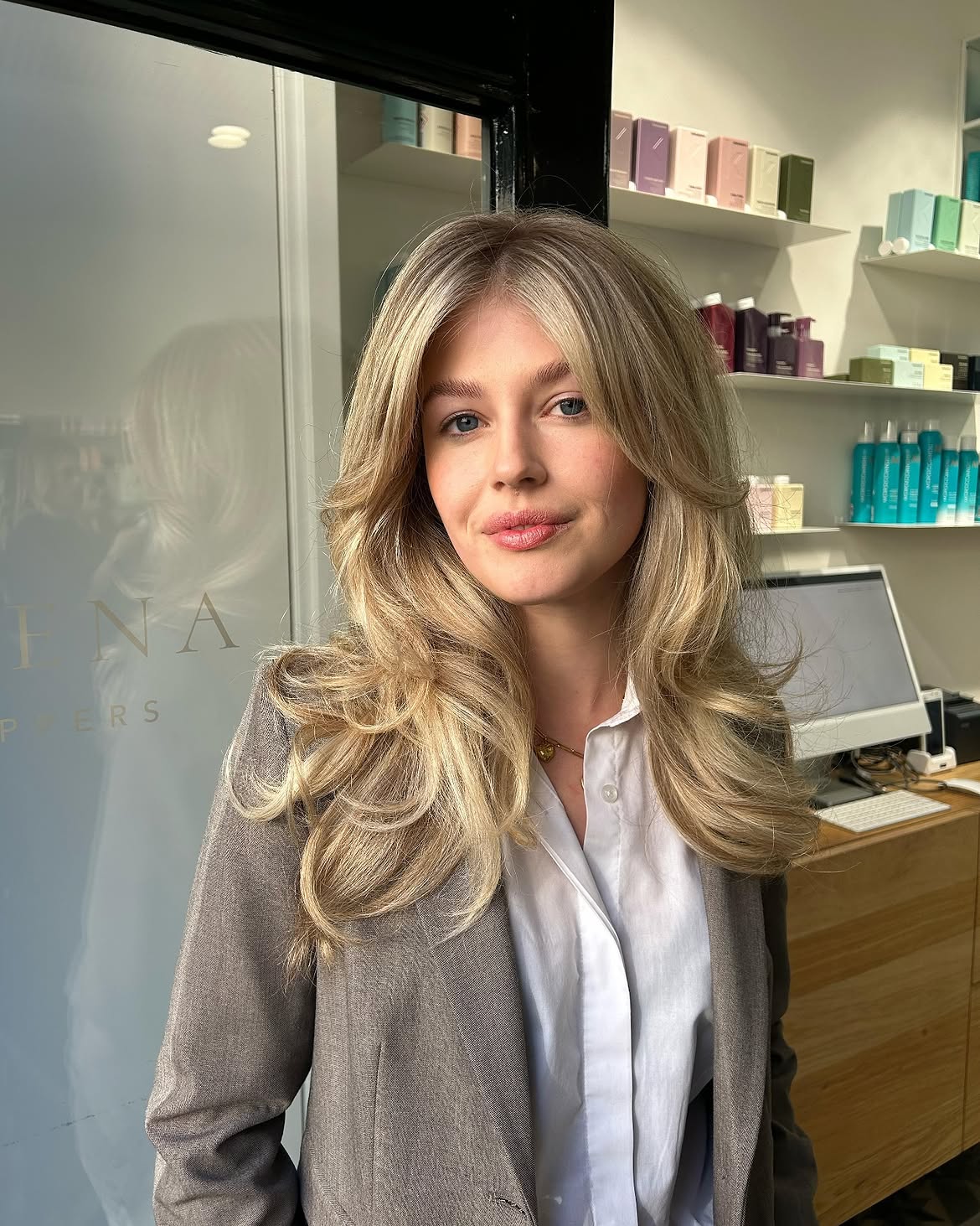 34. Blowout Layers with Soft Curtain Bangs