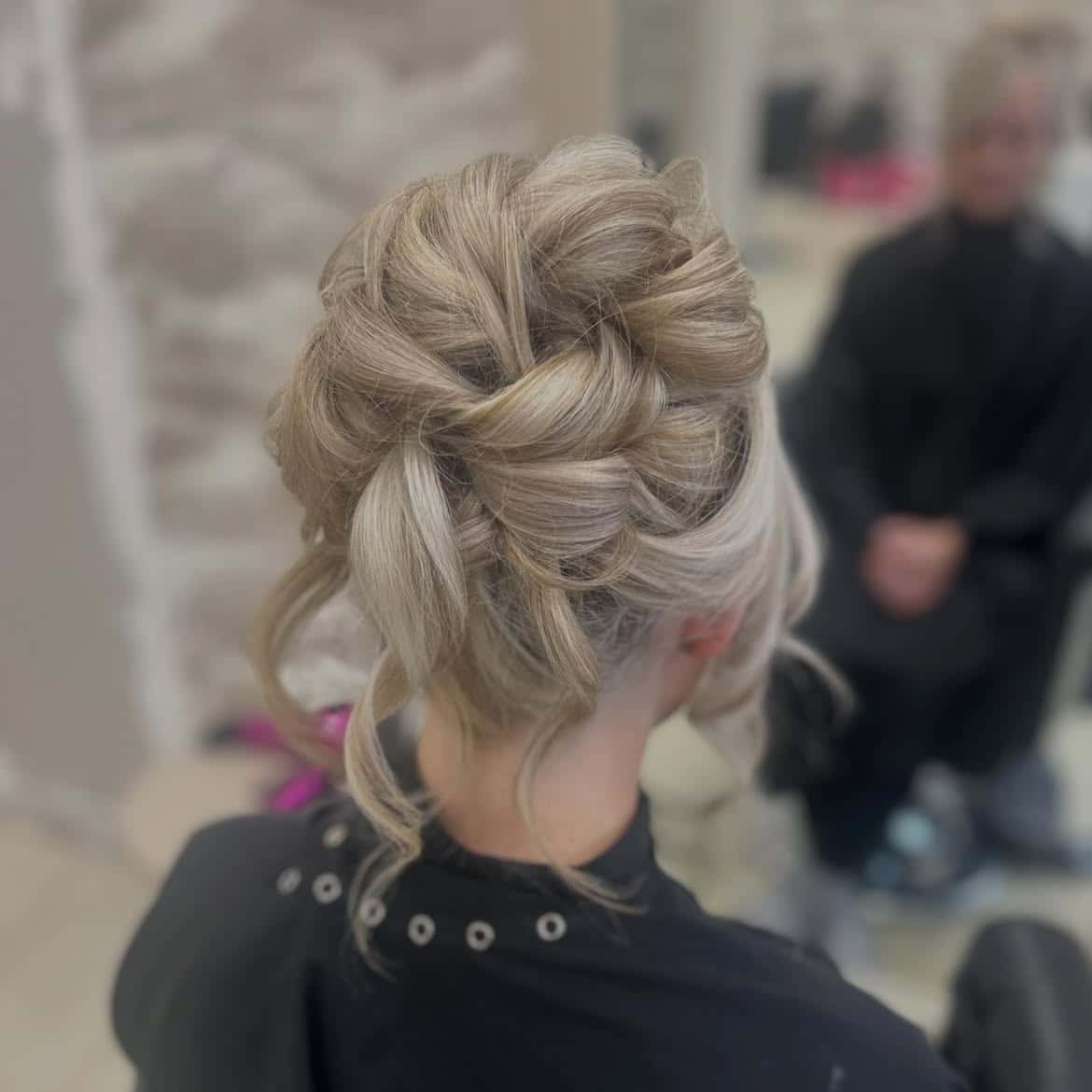 9. Braided Updo with Tousled Texture