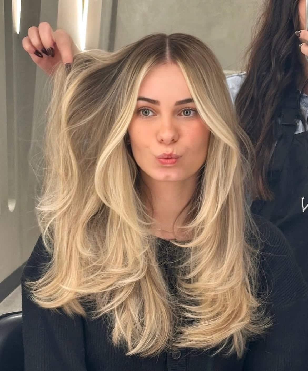 10. Buttercream Balayage with Face-Framing Layers