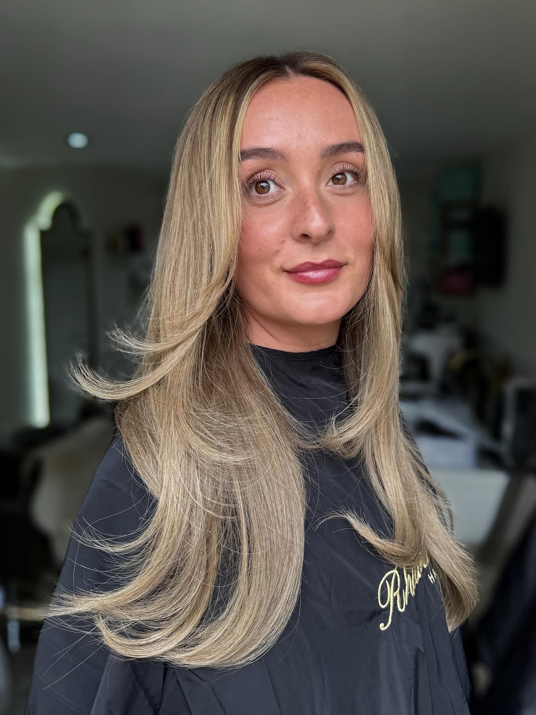 5. Butterfly Layers with Face-Framing Honey Highlights