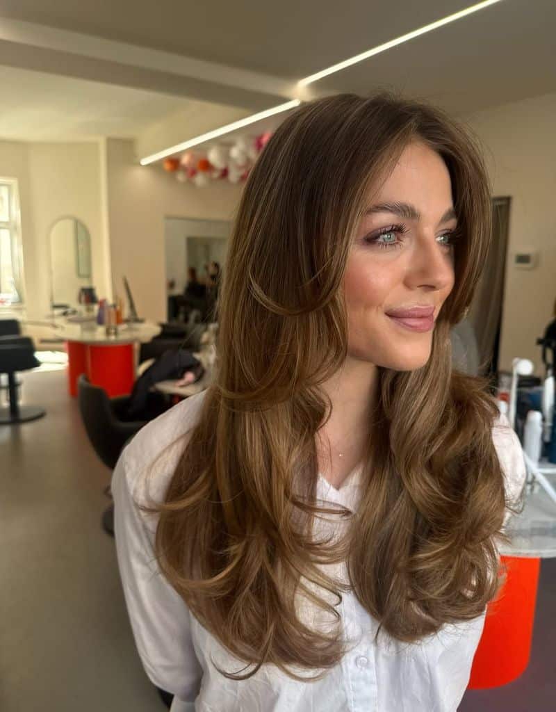 46. Caramel-Kissed Blowout with Long Layers