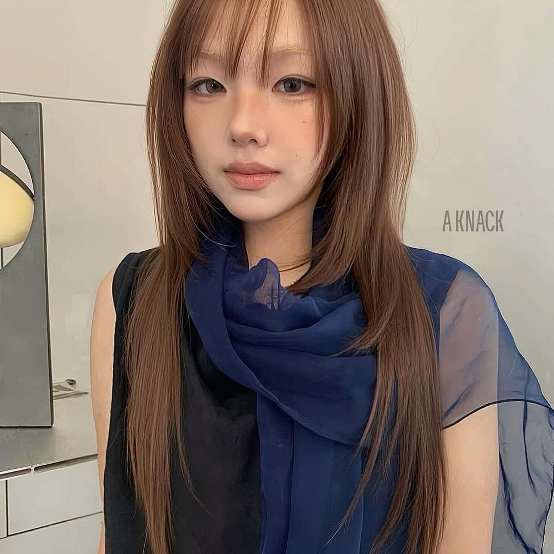 31. Caramel Layered Cut with Wispy Bangs