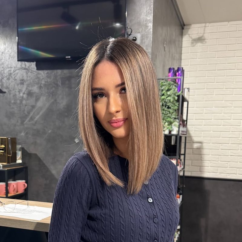 39. Center-Parted Ash Blonde Lob
