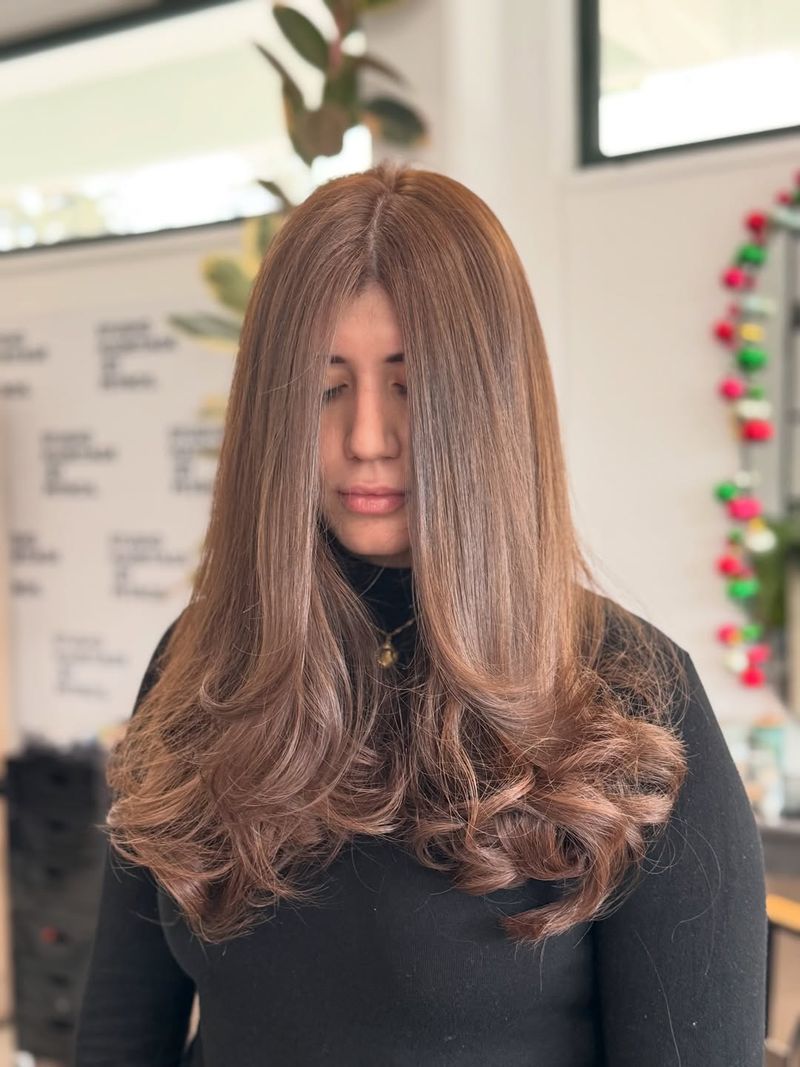 34. Center-Parted Blowout with Curled Ends