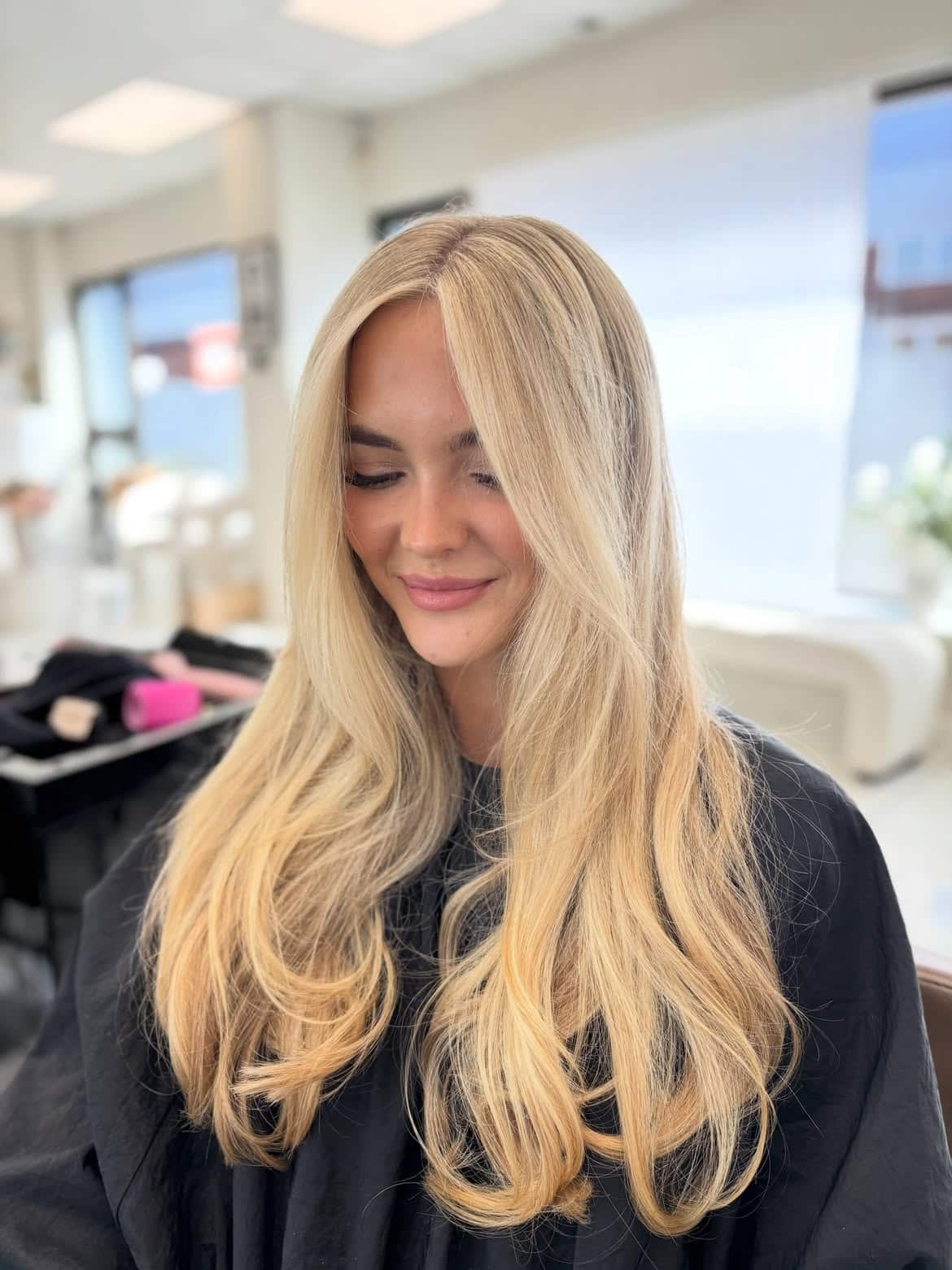 32. Center-Parted Butter Blonde Blowout