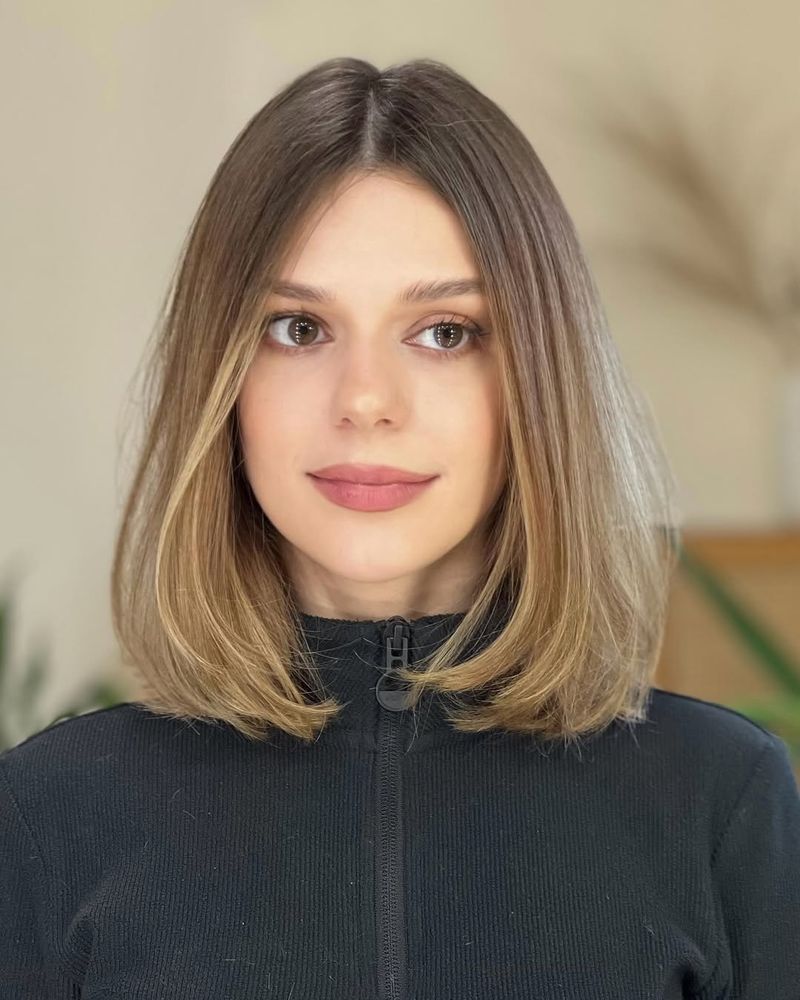 19. Center-Parted Lob with Subtle Face-Framing Highlights