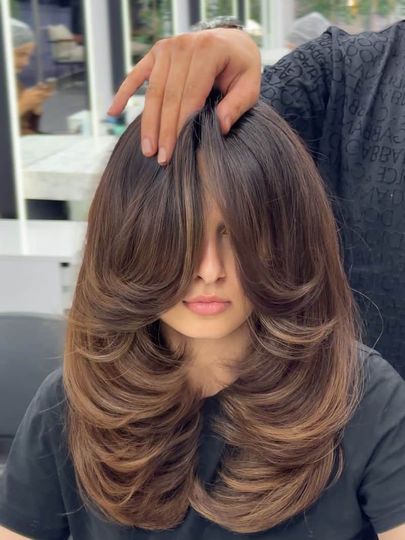 7. Chestnut Cascade With Face-Framing Layers