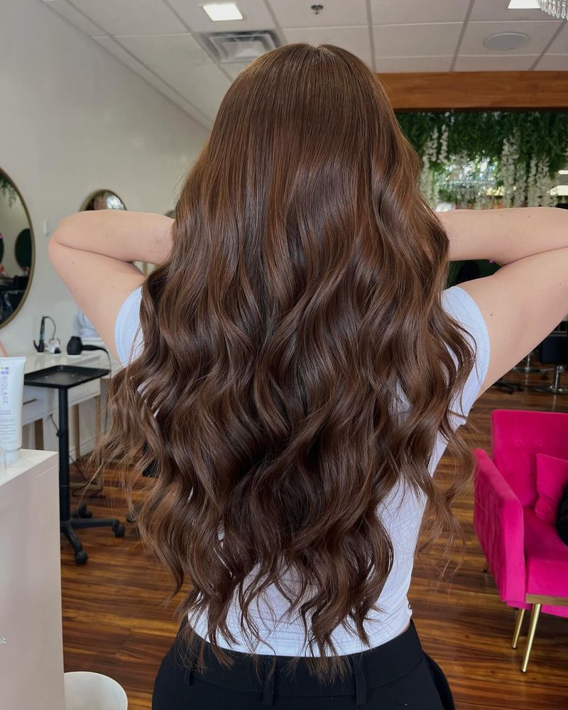 26. Chestnut Curls with Dimensional Highlights