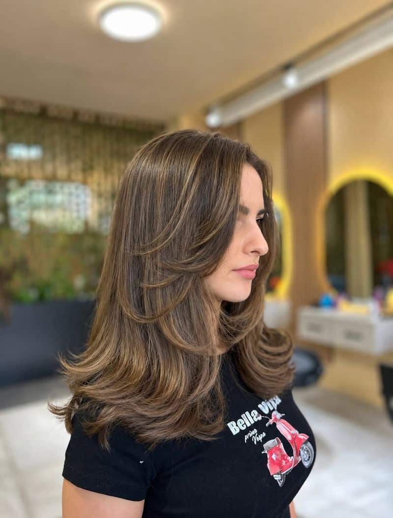 16. Chestnut Waves with Dramatic Face-Framing Layers
