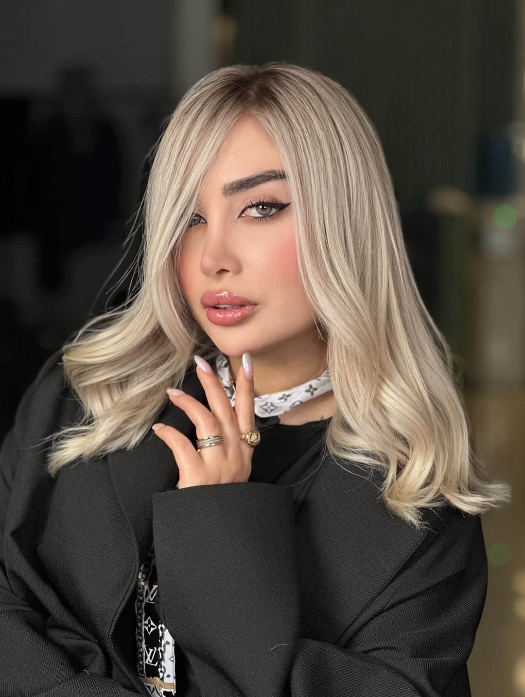 30. Cool Ash Blonde Sweep