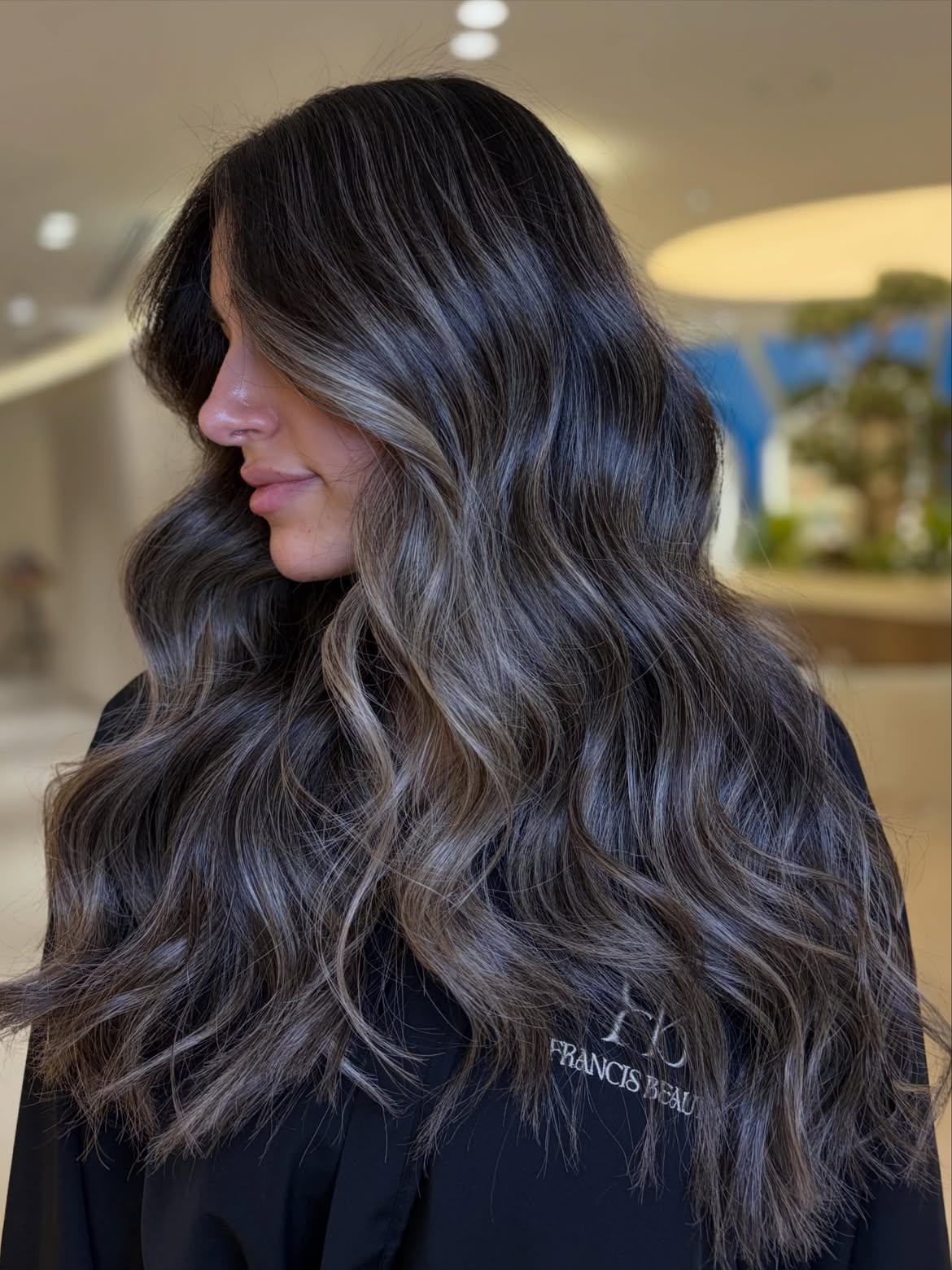 34. Cool-Toned Mocha Waves with Soft Face-Framing Layers