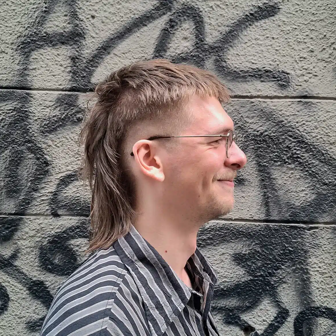 20. Cropped Fringe Mullet with Shaved Sides
