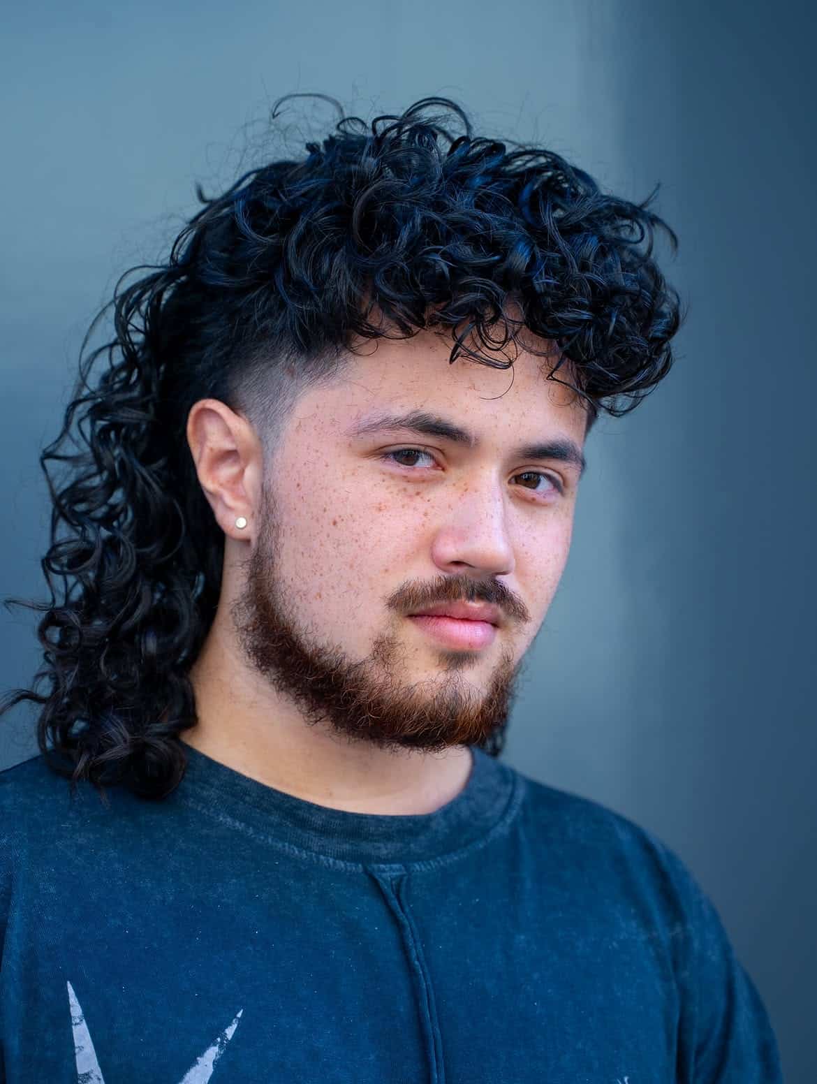 6. Curly Fade Mullet