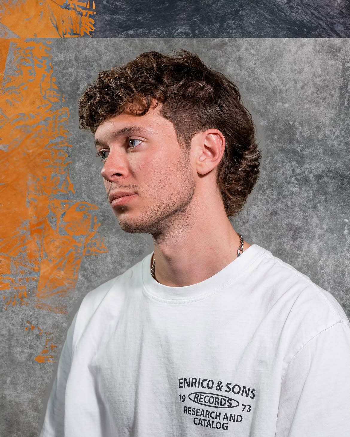 21. Curly Mullet with Low Tapered Sides