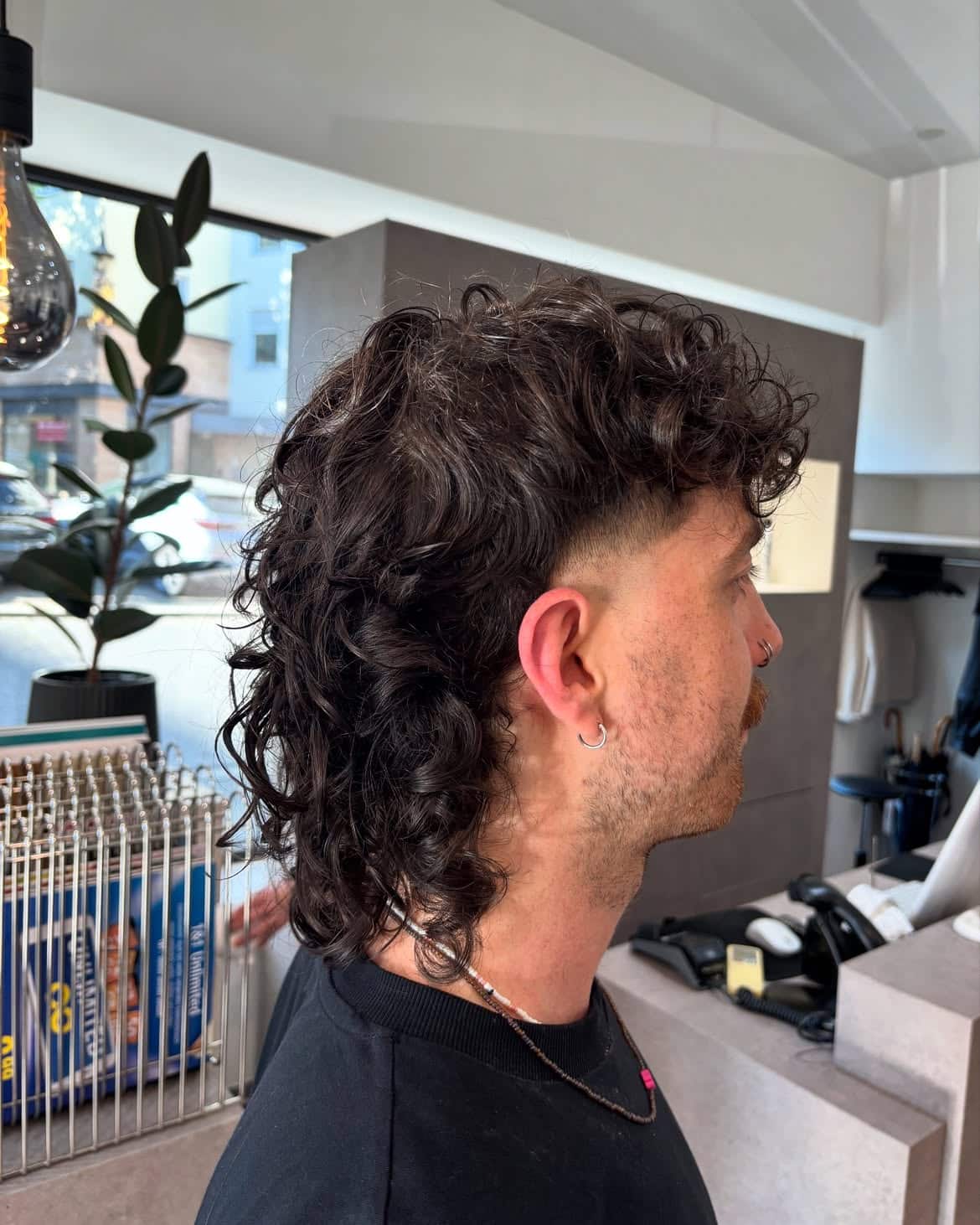 33. Curly Mullet with Tapered Sides
