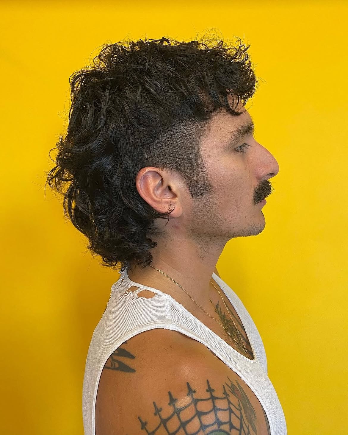 14. Curly Mullet with Tapered Sides