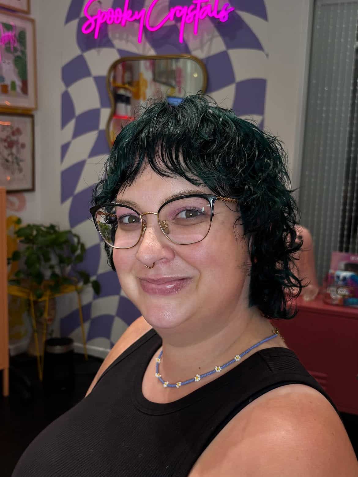 28. Curly Teal Pixie Mullet with Baby Bangs
