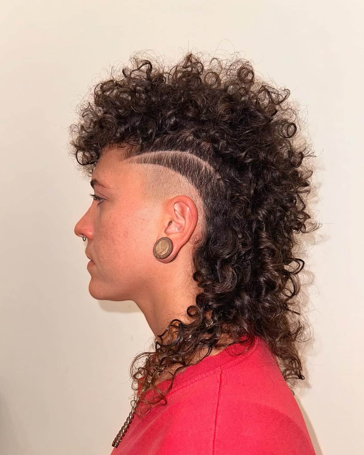 3. Curly Undercut Mullet with Hard Part