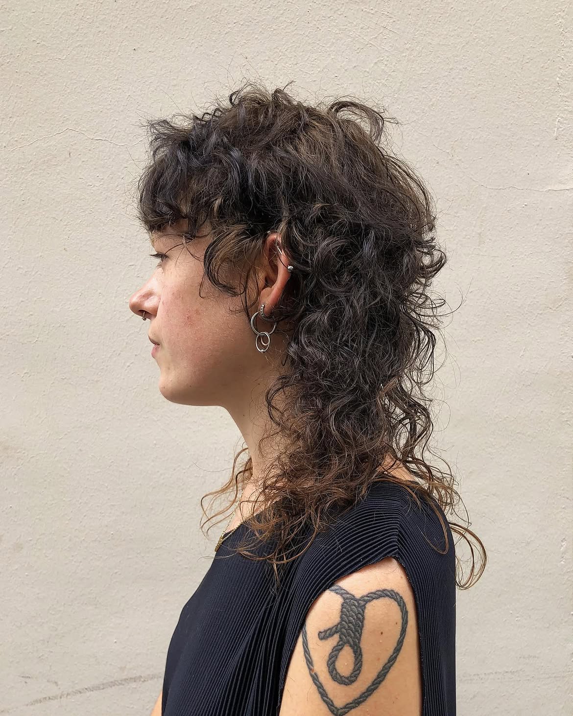 2. Dark Brown Curly Shag Mullet