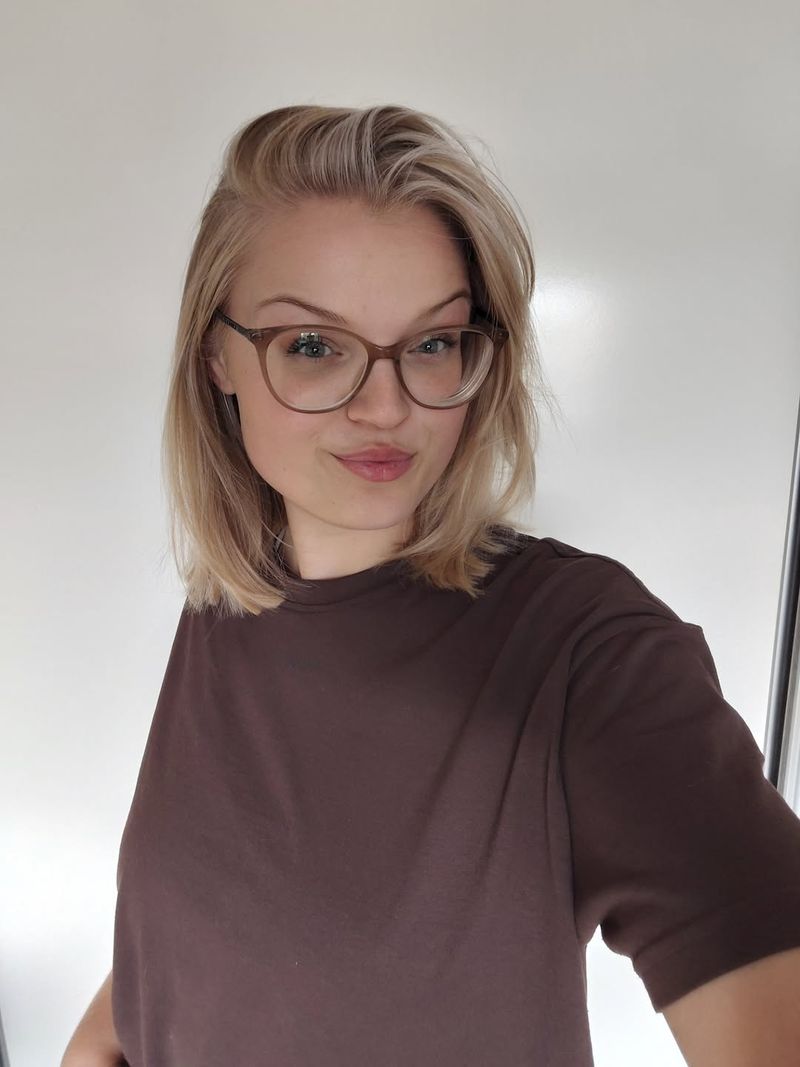 48. Deep Side-Parted Blonde Lob