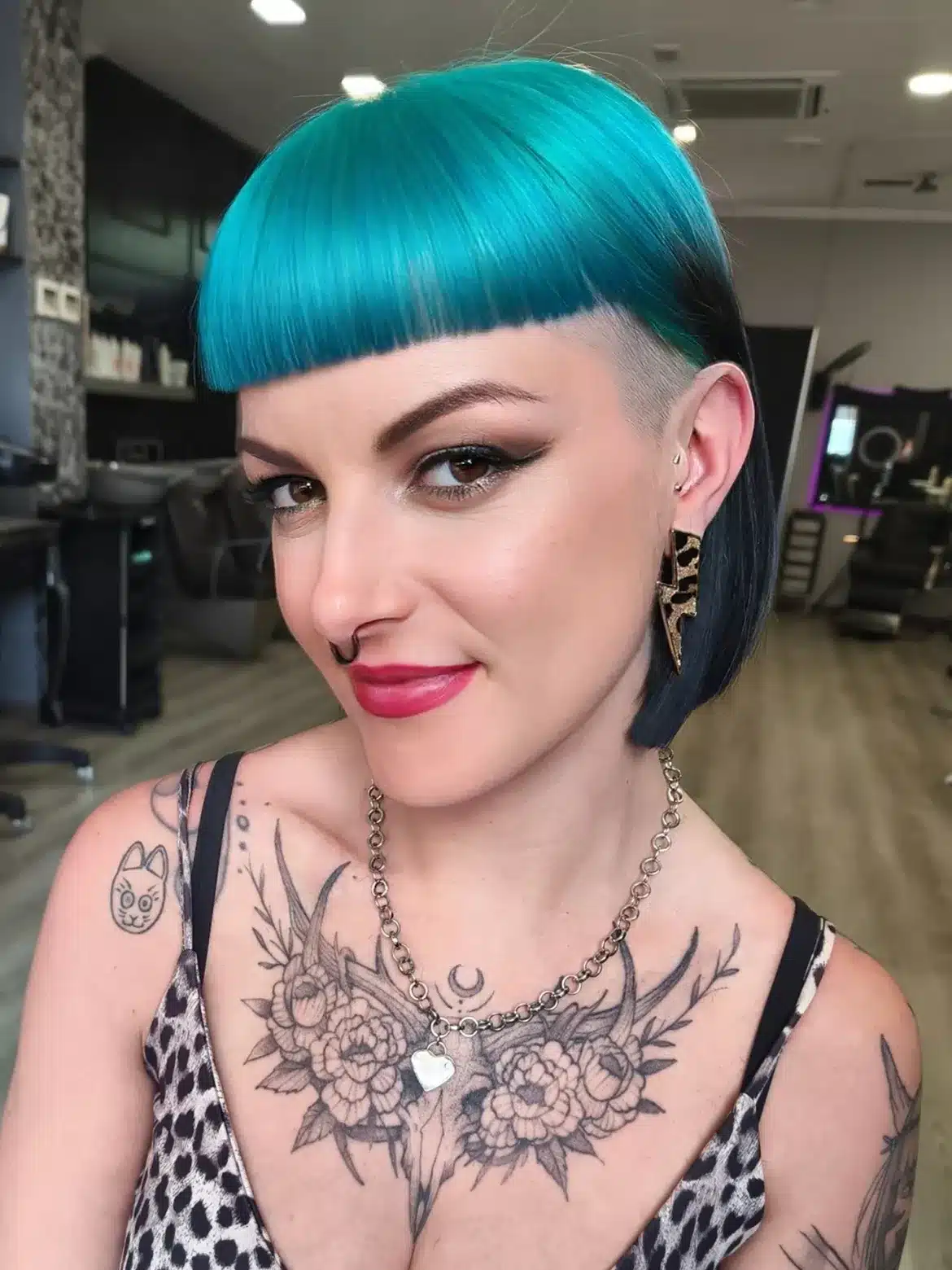 22. Electric Blue Undercut Bob with Micro Fringe