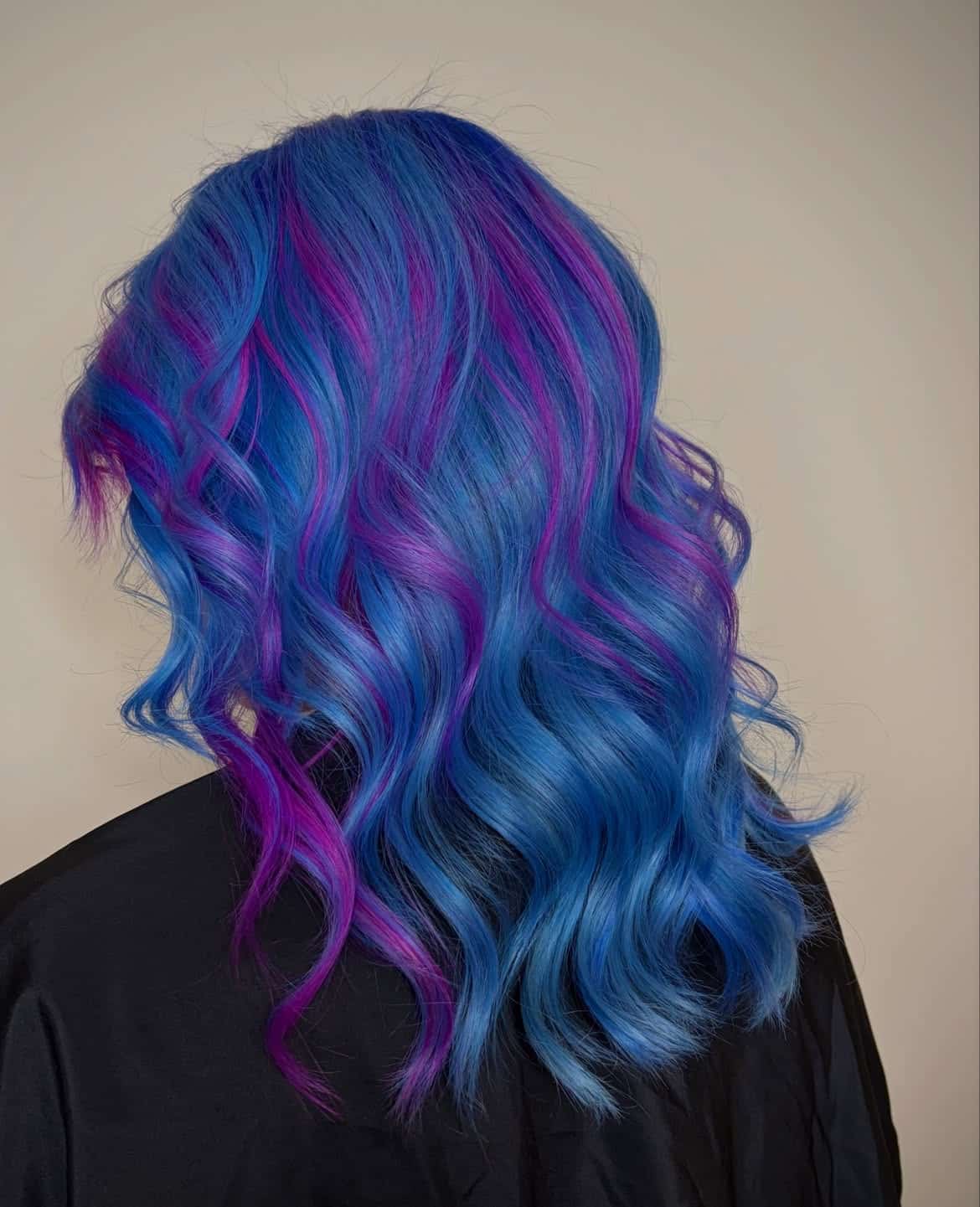 7. Electric Blue Waves with Magenta Highlights