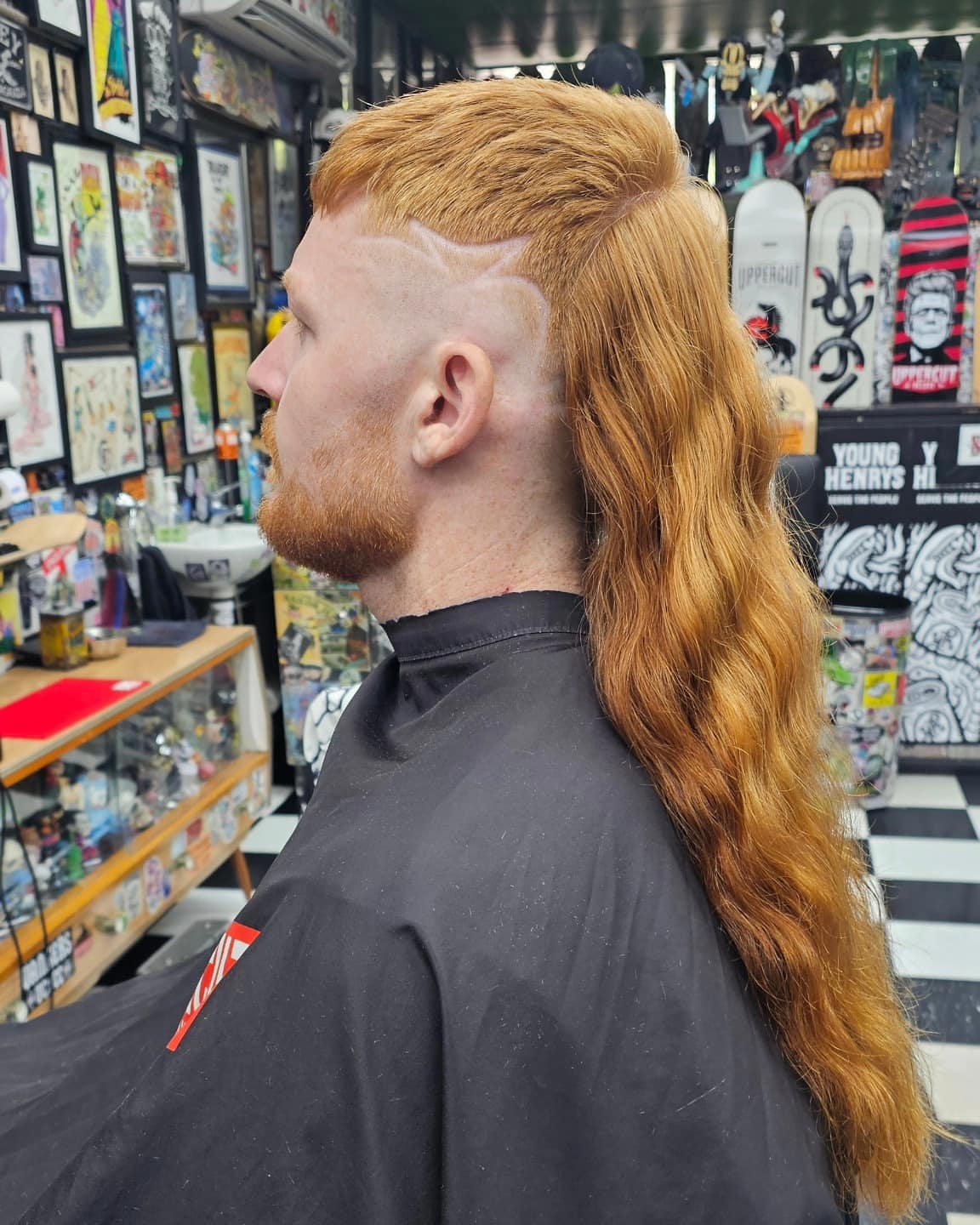 10. Ginger Waves with Shaved Hair Design