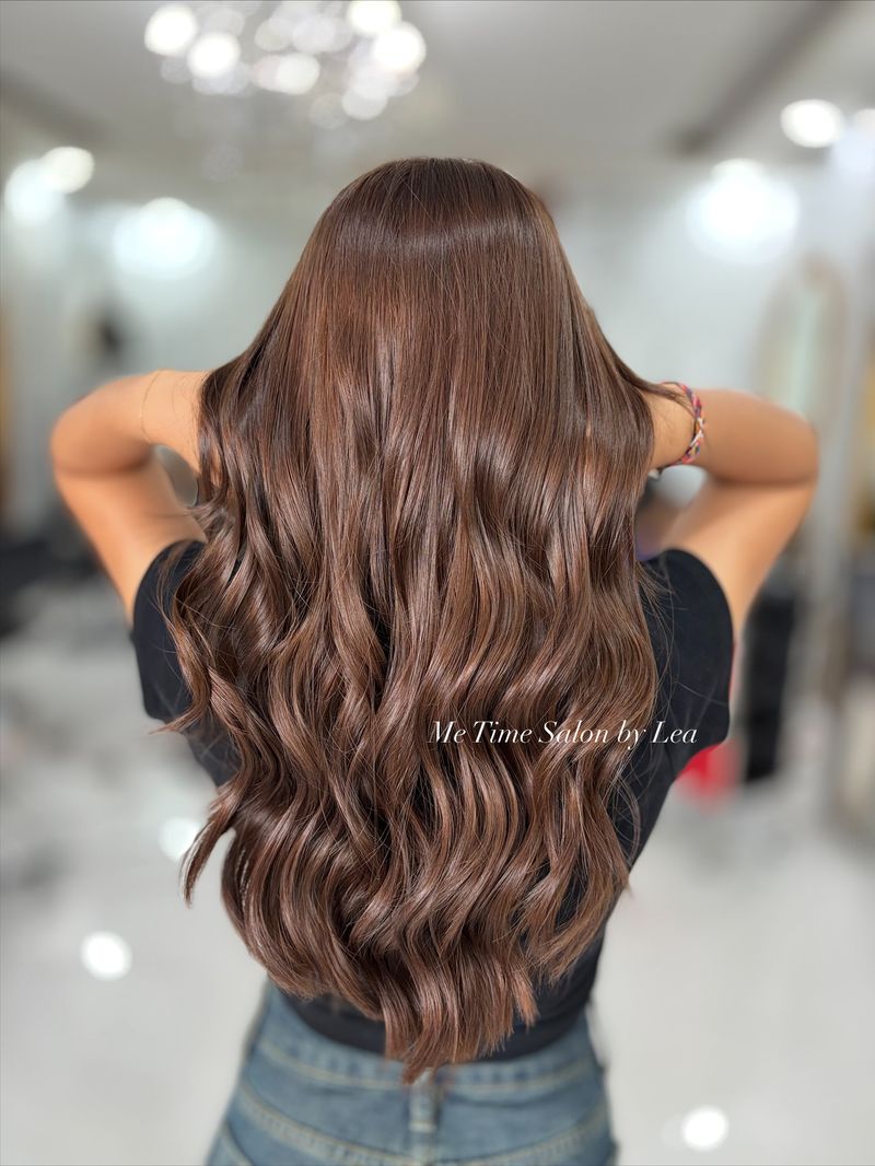 23. Glossy Chestnut Waves