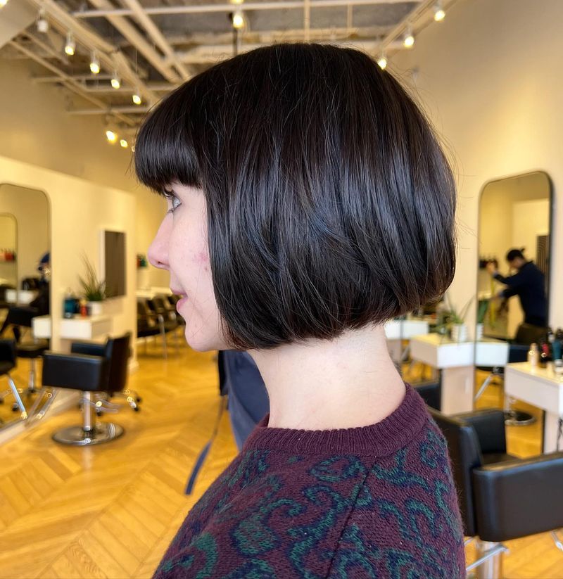 9. Glossy French Bob with Blunt Bangs