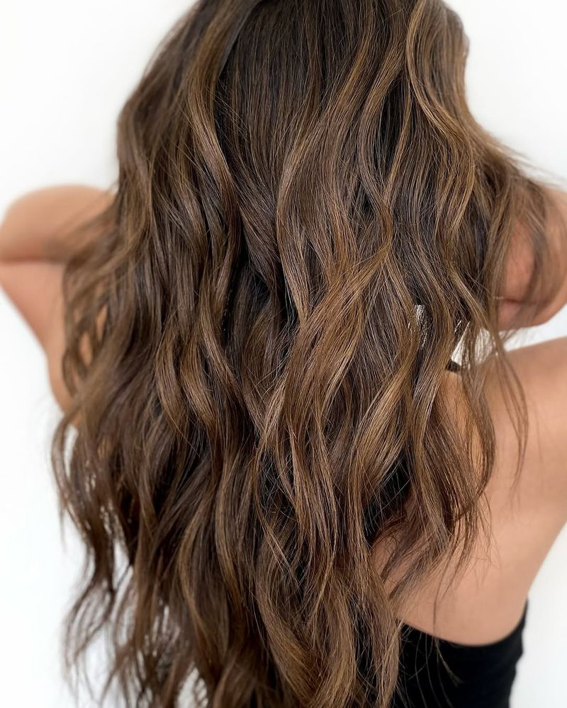 39. Golden Chestnut Balayage Waves