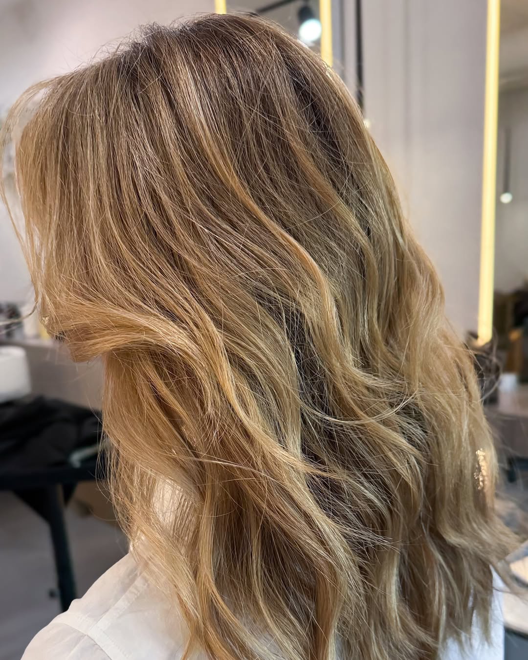 14. Golden Honey Balayage Waves