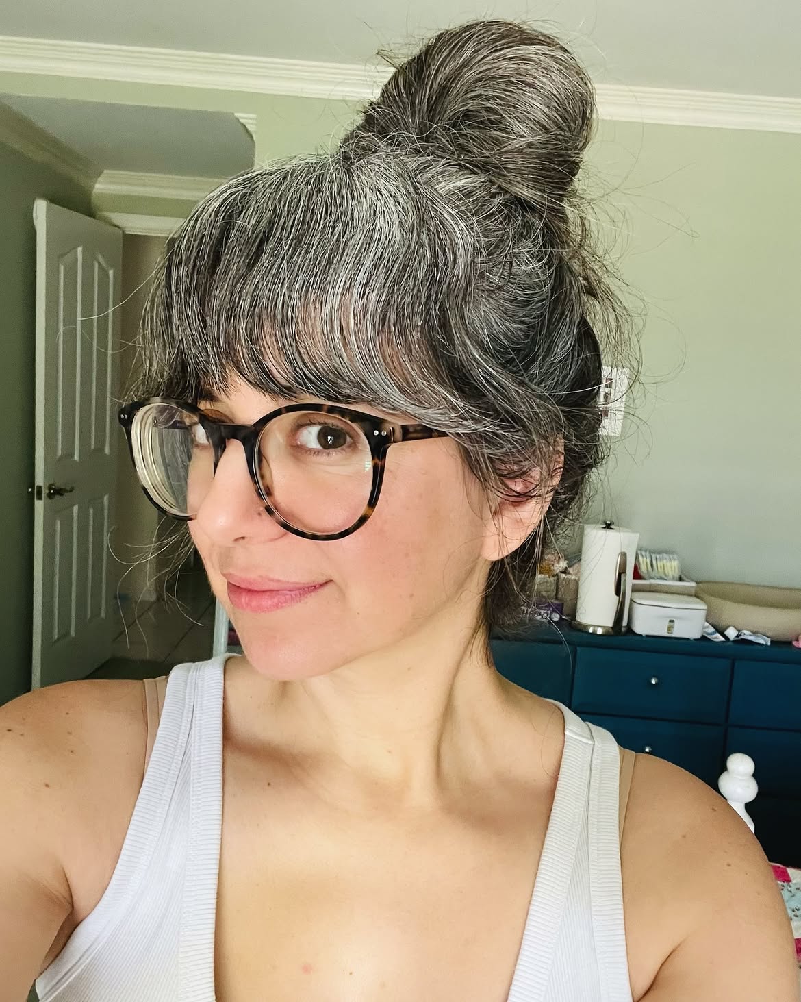 34. High Topknot with Piecey Fringe