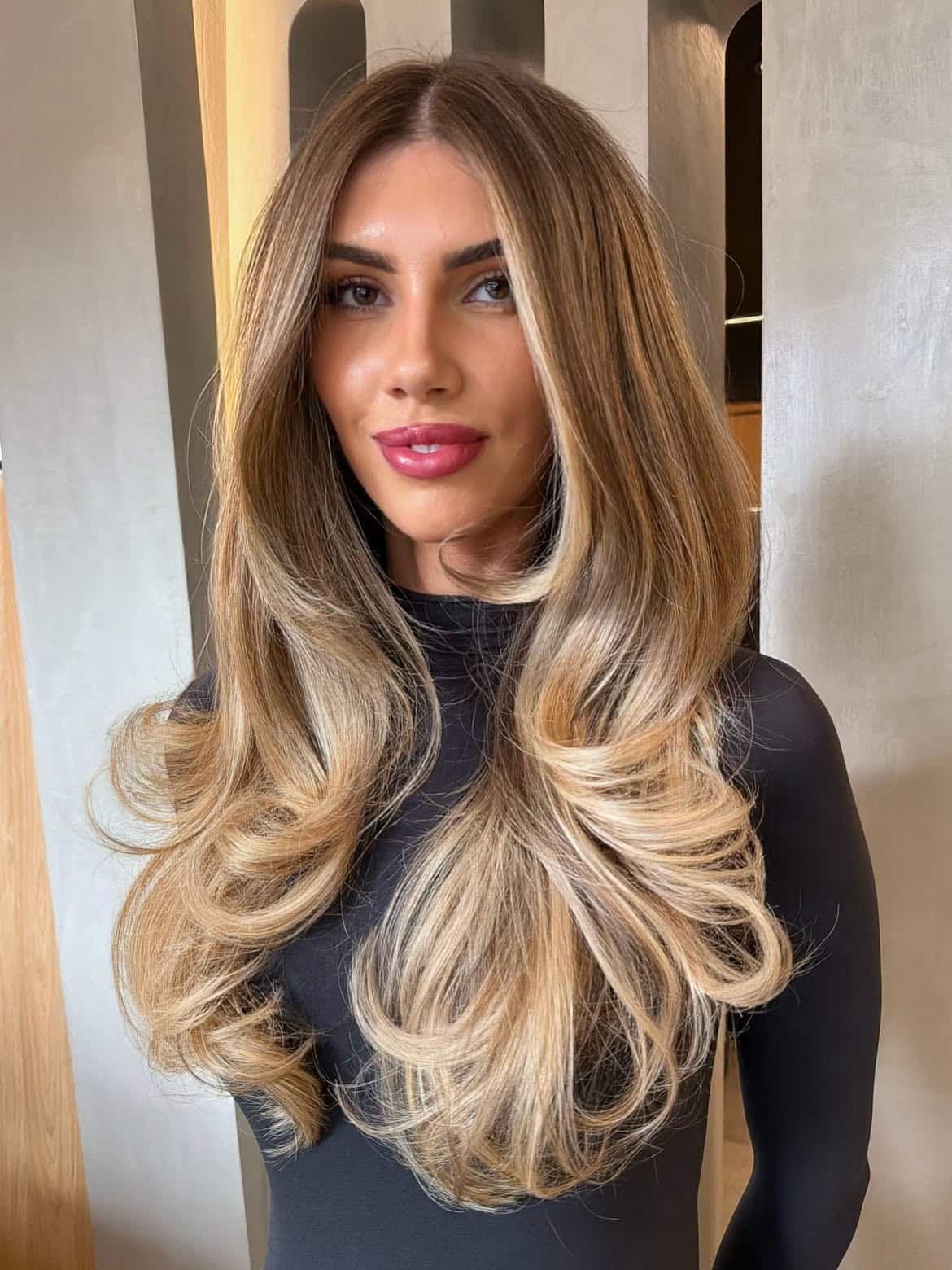 55. Honey Blonde Blowout with Deep Curtain Layers
