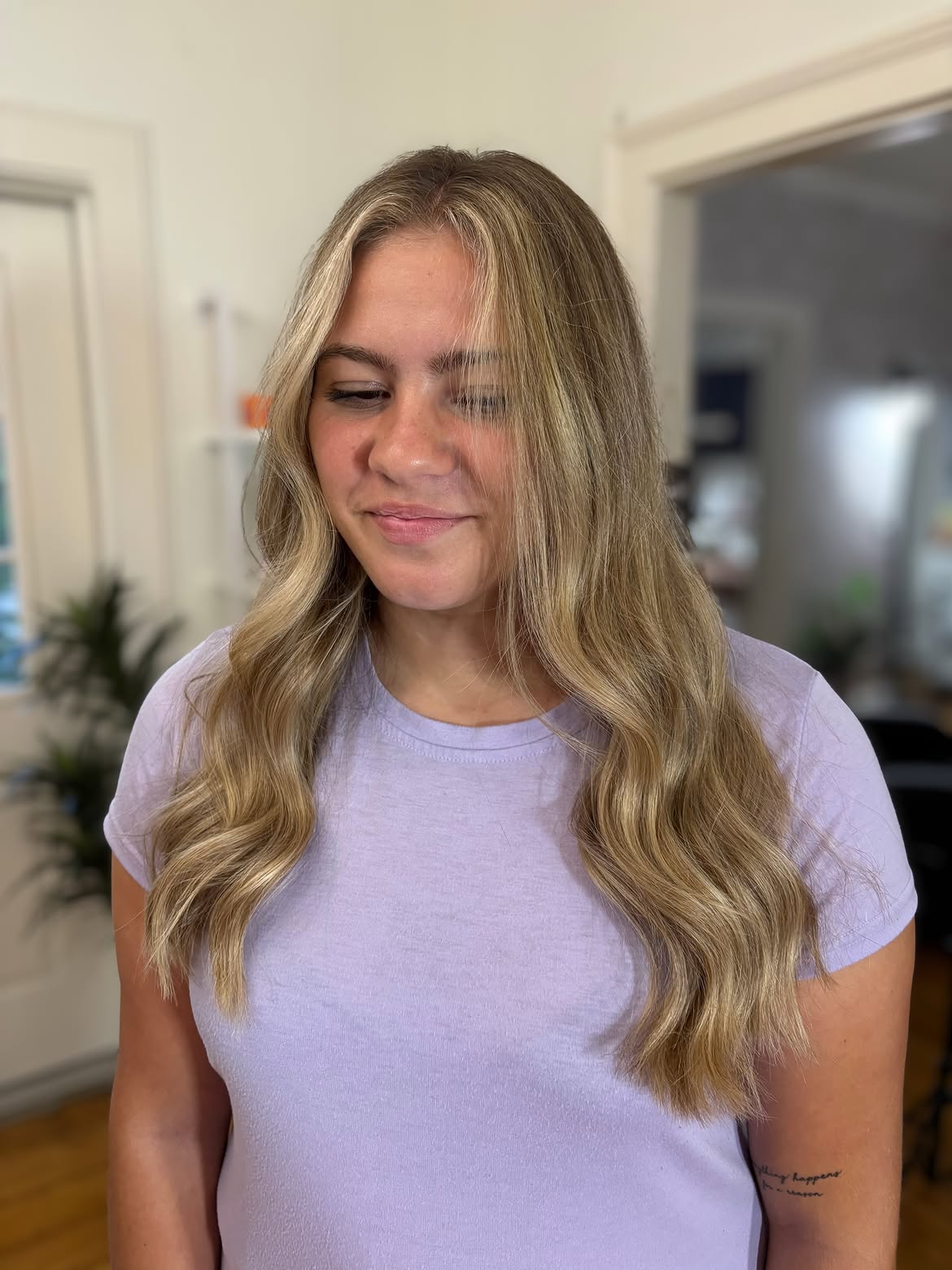 12. Honey Blonde Waves with Bright Face-Framing Highlights