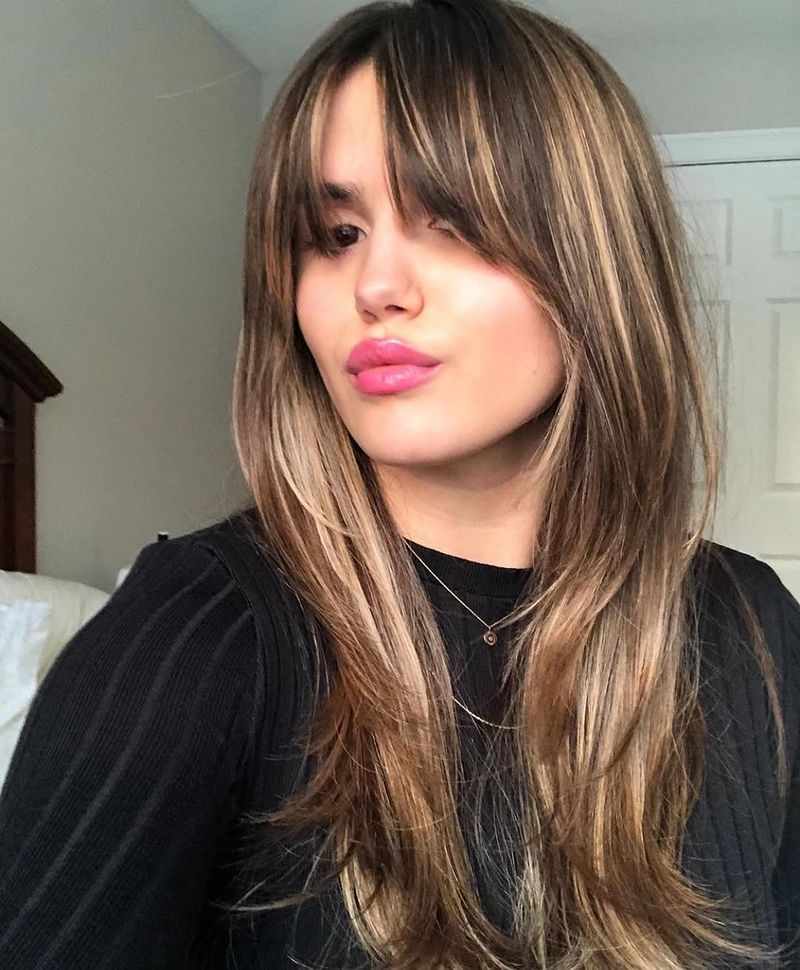 28. Honey Highlighted French Fringe