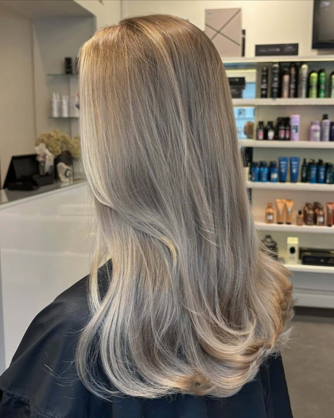 37. Icy Balayage with Inward Blowout Ends