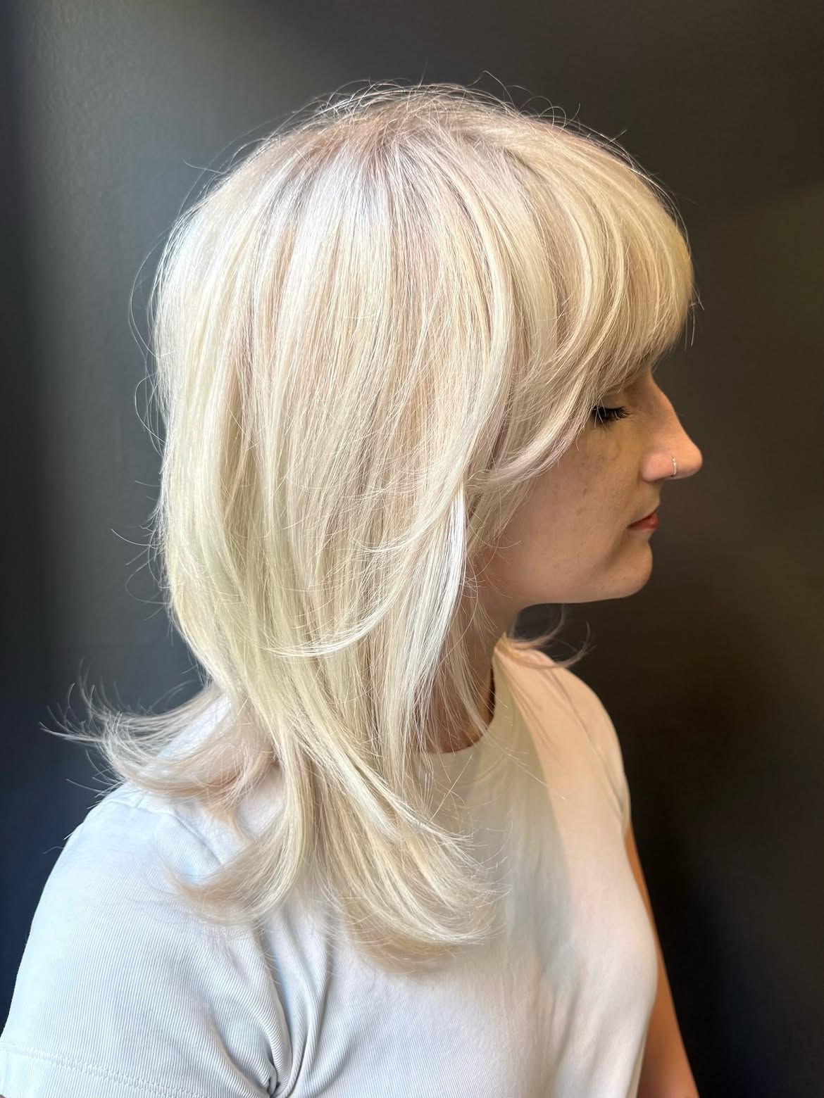 39. Icy Layered Shag with Full Bangs